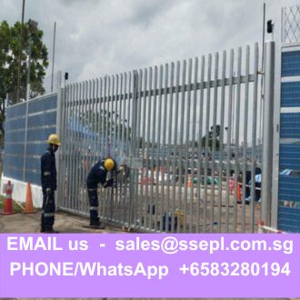Two workers in yellow helmets standing by a tall metal security fence at a construction site; a purple banner at the bottom displays contact email sales@ssepl.com.sg and WhatsApp/phone +6583280194.